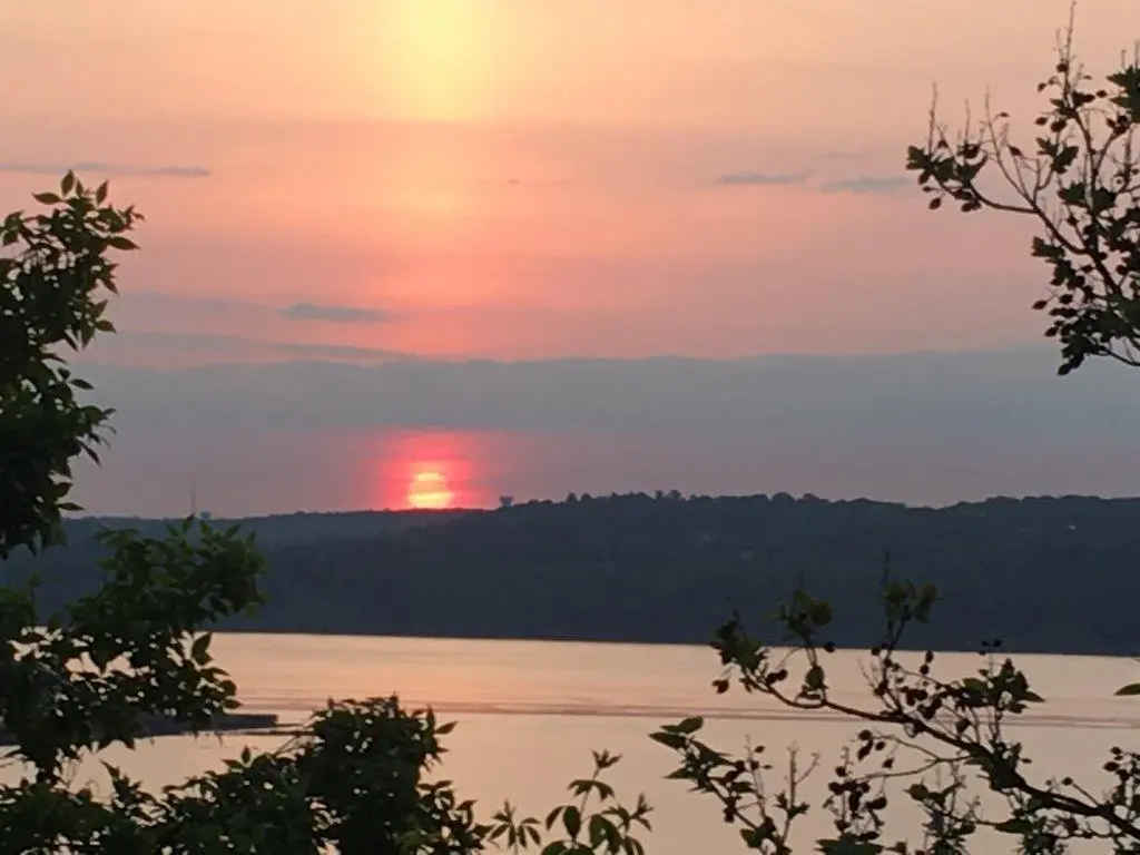Sunset over the water at Rock the Park, Orangeburg NY